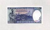 Rwanda 100 Francs - Frau, Baby - Karisimbi- und Visoke-Vulkane (Virunga-Vulkankette) - -