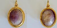 Gold pendant decorated with a roman magical intaglio on amethyst : Dyonisos -