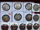   Price of one random year Morgan dollar (AU grade)  75.59 &pound;  +  30.24 &pound; shipping