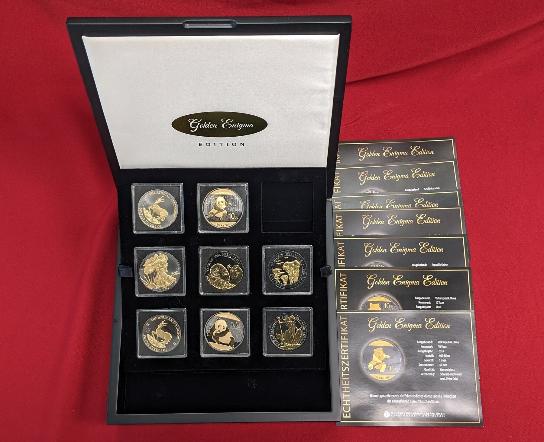 diverse Länder 8 x 1 Unze Silber 2014 - 2015 Golden Enigma Edition - 8  Münzen BU partly gilded with box & coa | MA-Shops